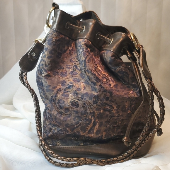 Tianni Handbags - 🚨LAST CALL🚨VINTAGE TIANNI LEOPARD 90's BUCKET/SHOULDER BAG